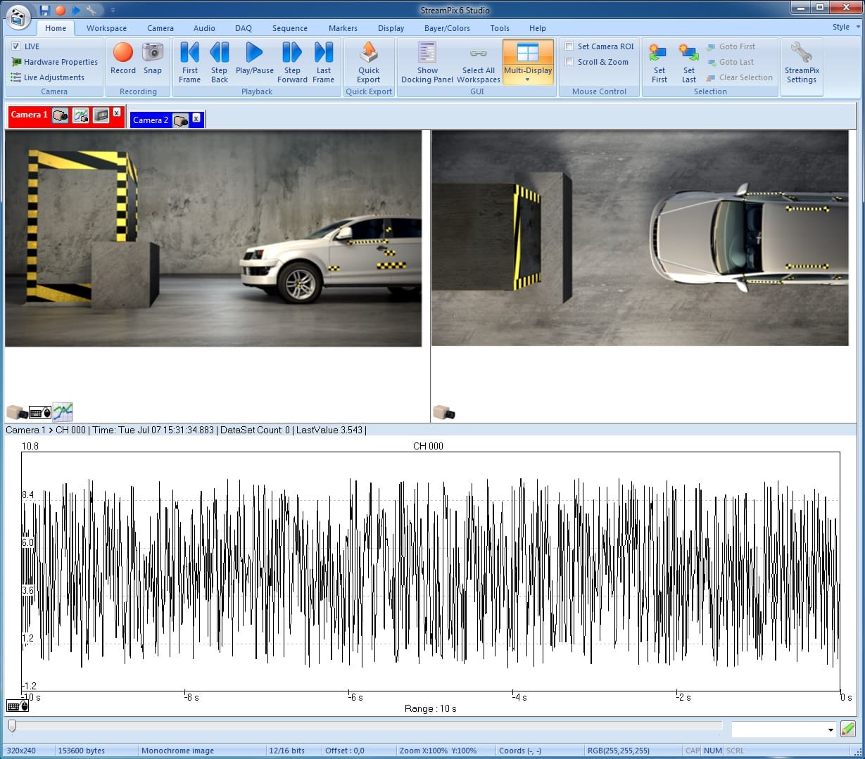 A car parked in front of a building with some sound waves.